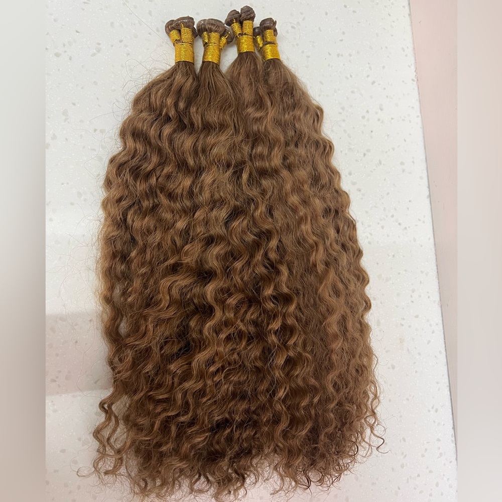 200grams of 100% human hair in deep wave. 16” Cut point wefts. Color #6